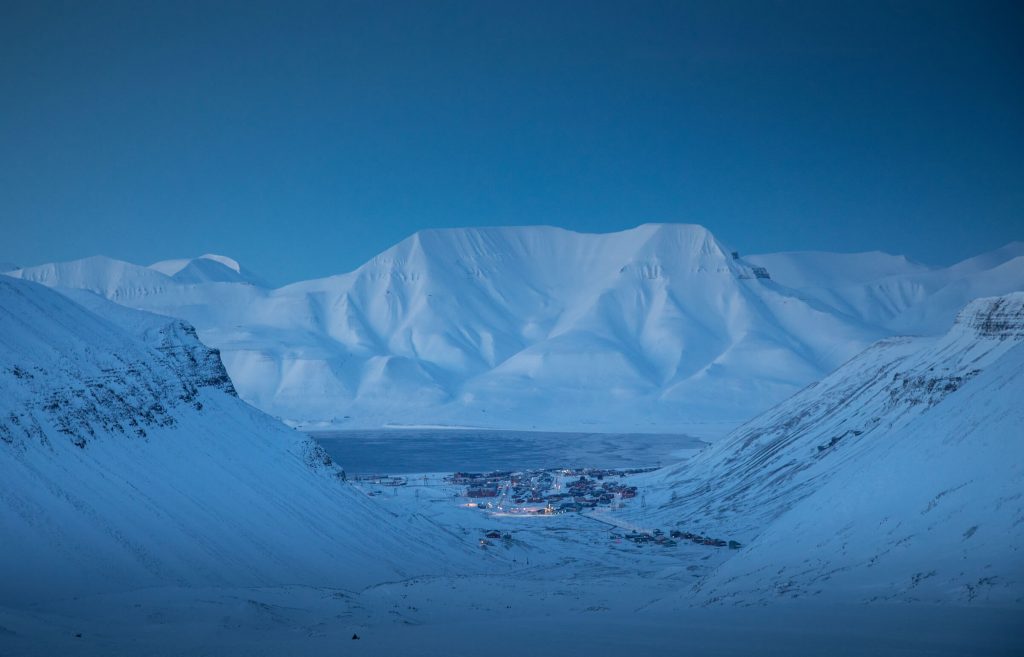 Use snowshoes or spikes to go on a glacier hike on our backyard glacier
