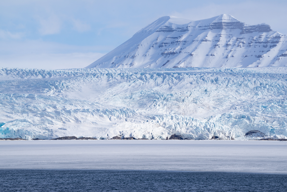 Sea ice in front of the glacier called "Nordenskiöld" in "Billefjord" on Spitsbergen in the Arctic