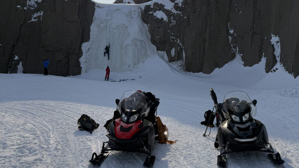 Ride a snowmobile to an ice wall in Svalbard