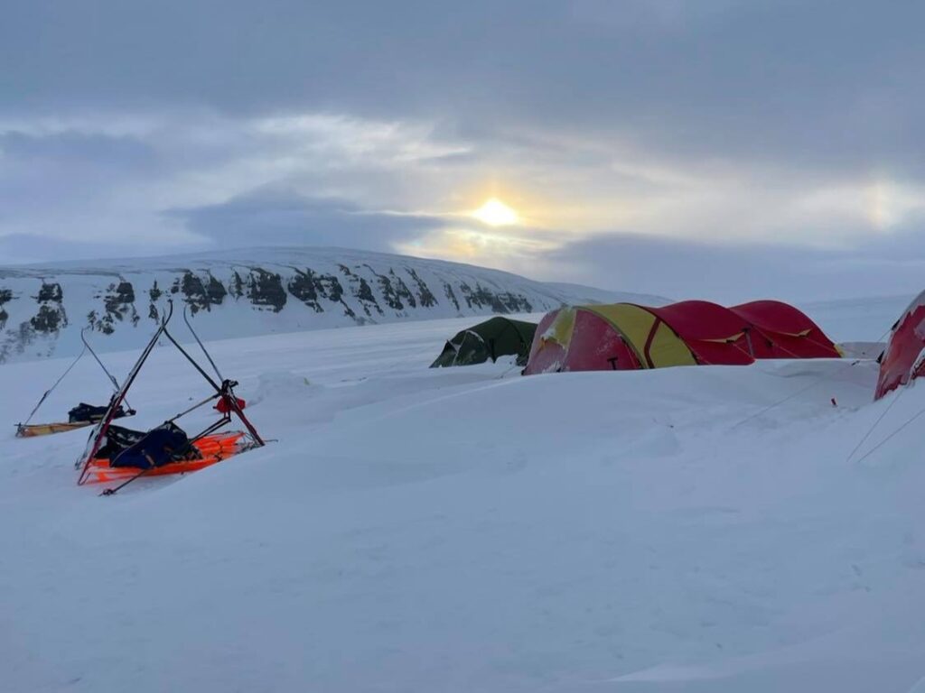 Midnight sun camp site on Svalbard crossing expedition