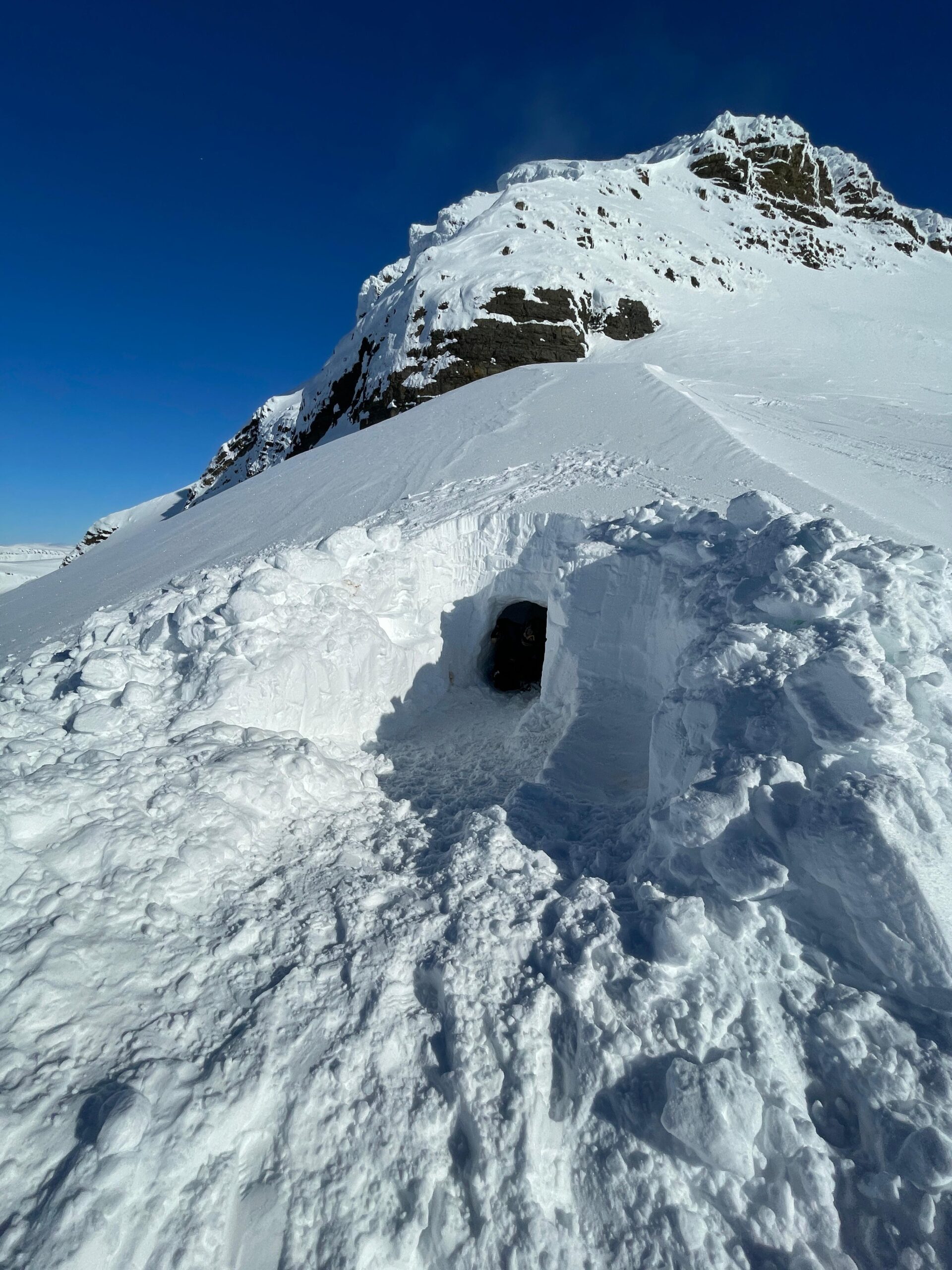 Snowcave building for one night in the Arctic with Backyard Svalbard