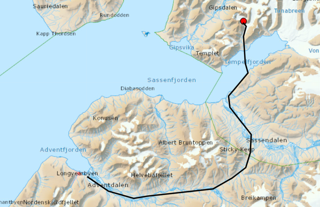 Ski touring camp expedition in the backcountry of Svalbard with snowmobiles in polar bear land.