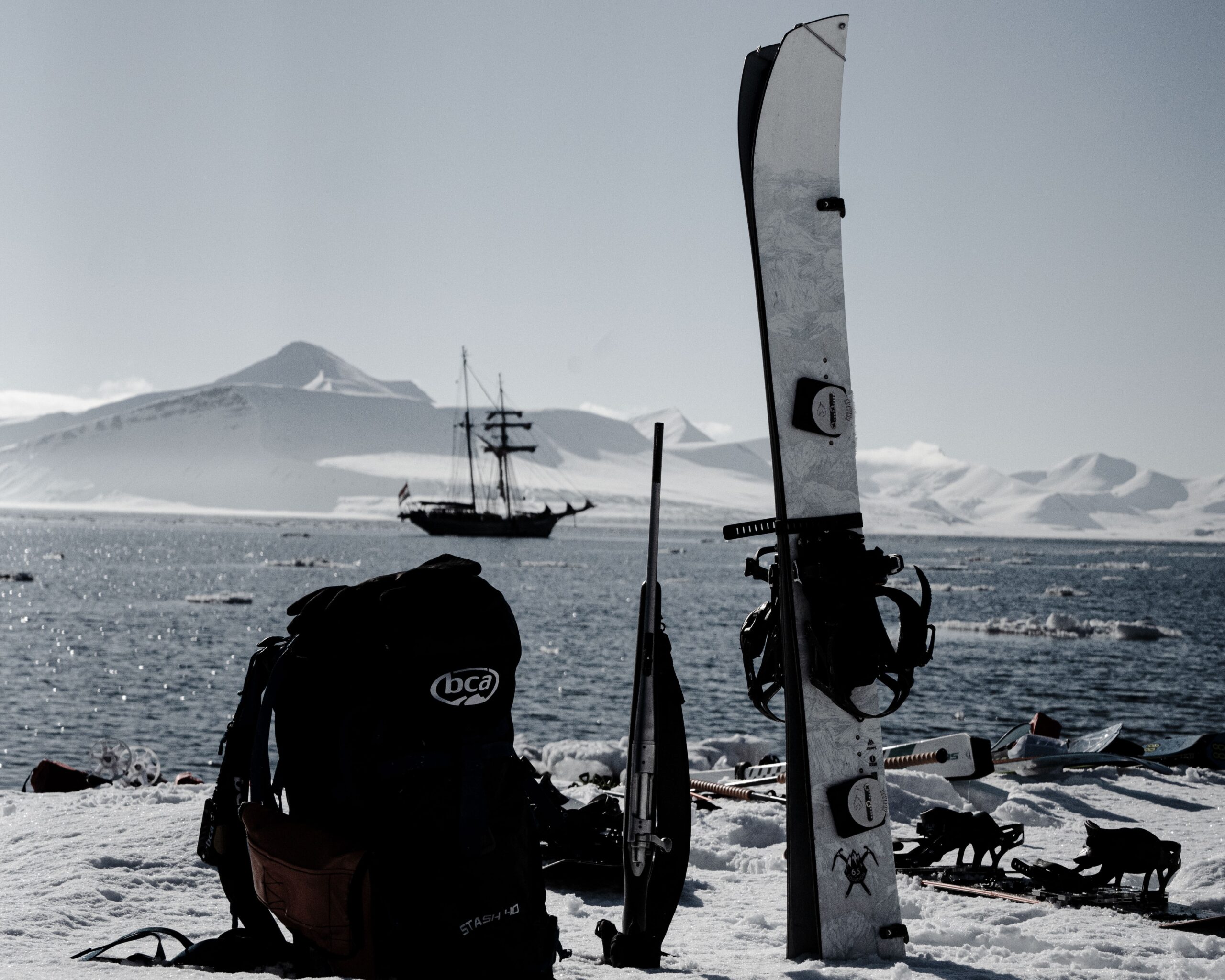 Backcountry skiing from summit to sea in untouched wilderness of Svalbard