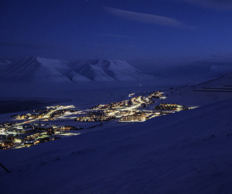 Dark season in October and February will bring the most spectacular blue lights to Longyearbyen from the hike to Platåfjellet