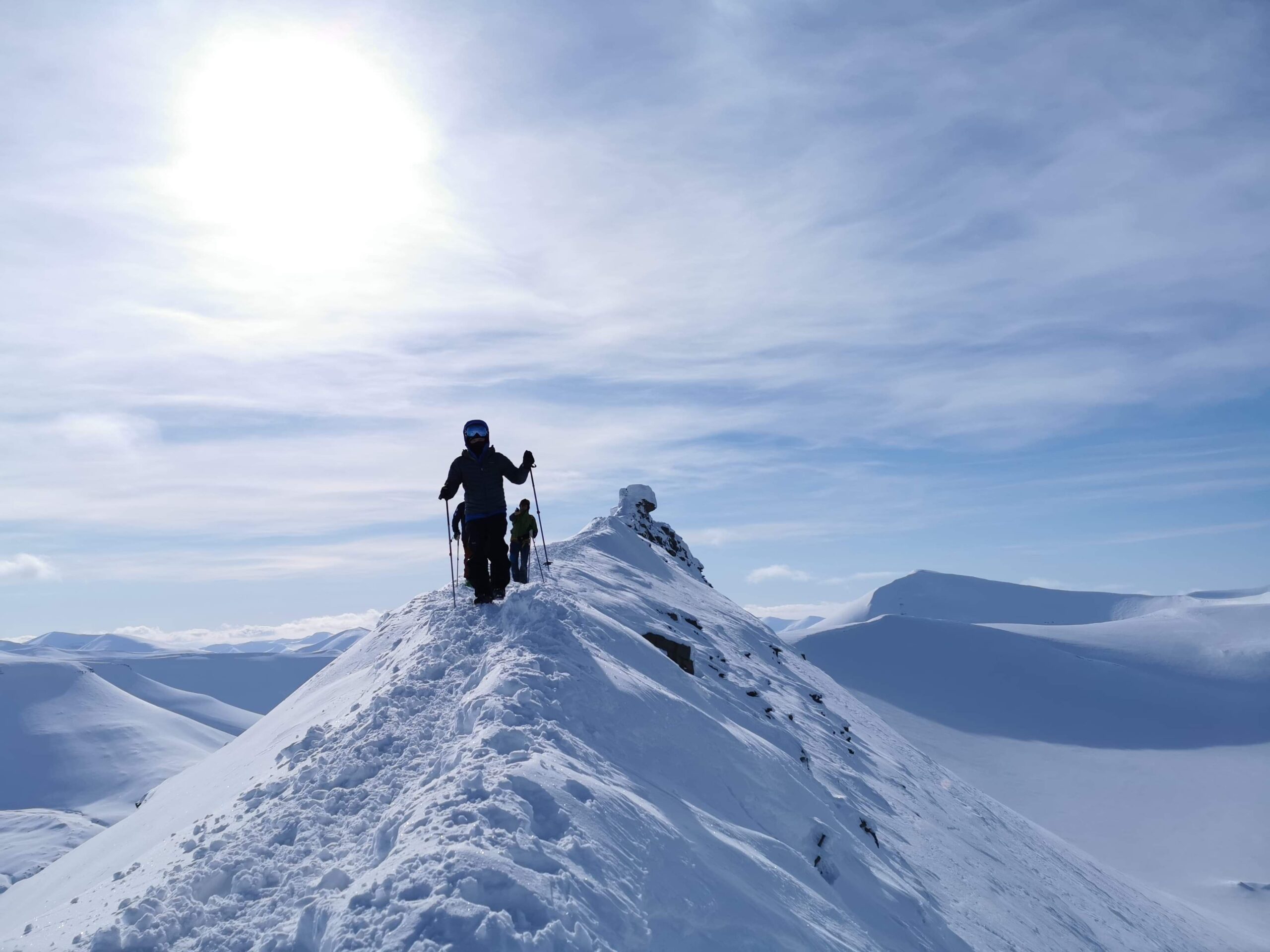 Join us on a ski touring exploration of the backcountry of Svalbard during sunny winter
