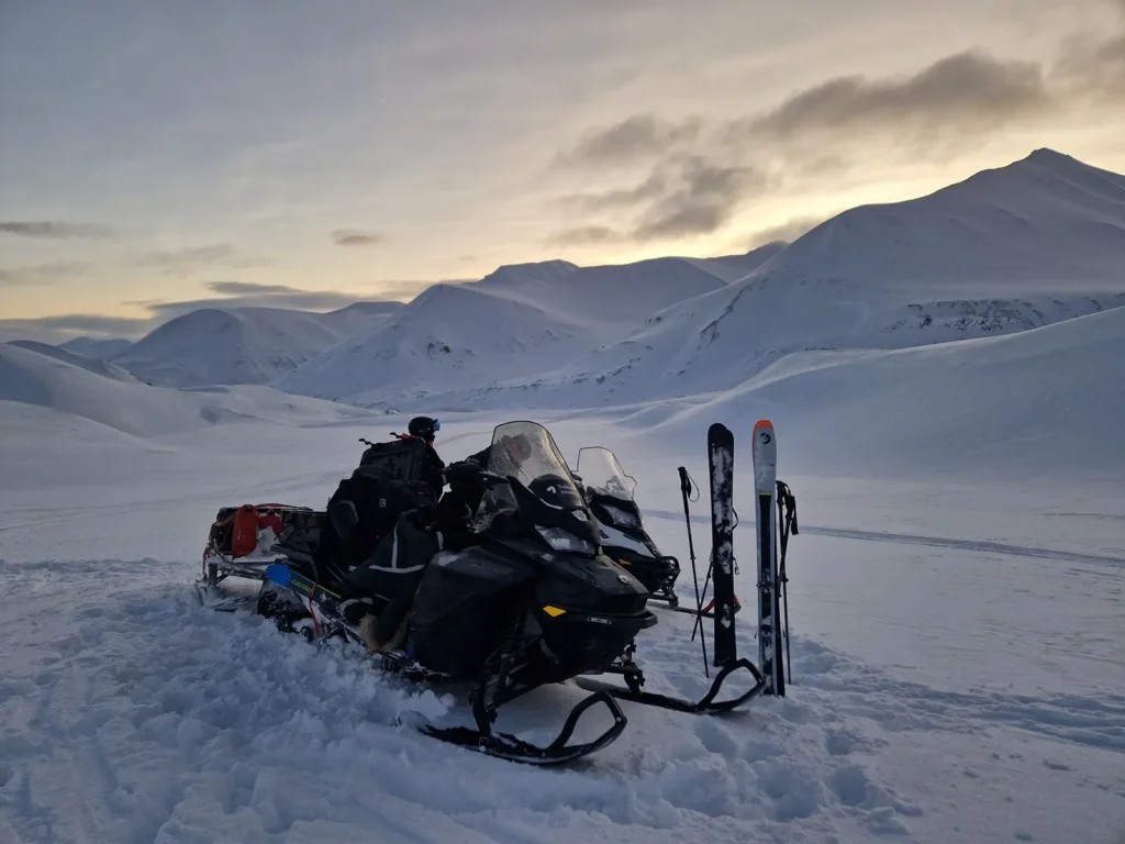 Join us for an exhilirating Svalbard experience where we combine snowmobile and ski touring for a full day excursion