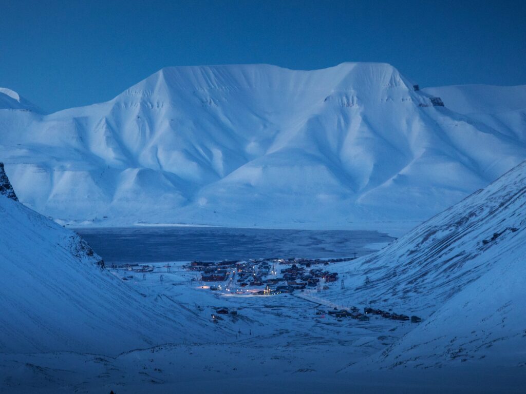 Enjoying the stunning view of Longyearbyen from the mountain returning from our ice cave hike