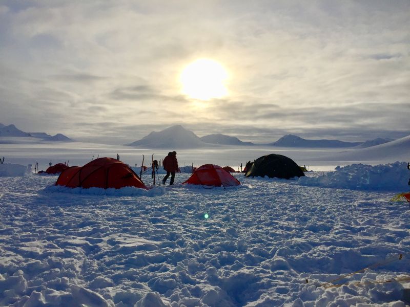 Svalbard Ski crossing camp under the midnight sun in the wilderness