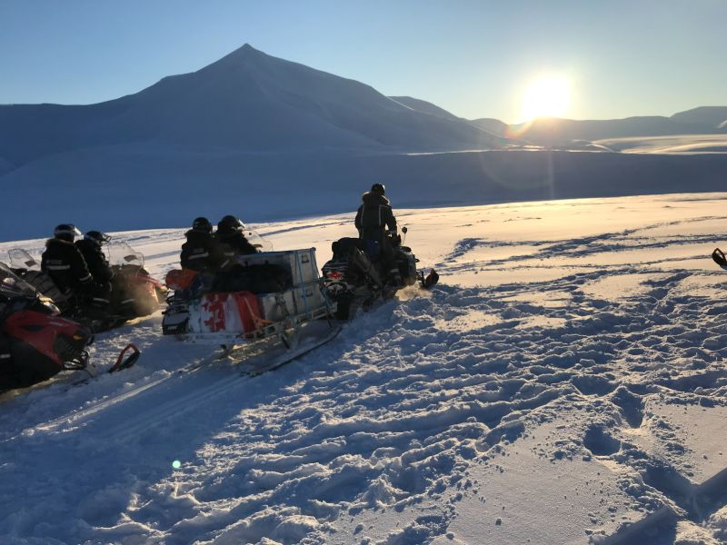 Svalbard ski crossing expedition start with snowmobile to the East coast