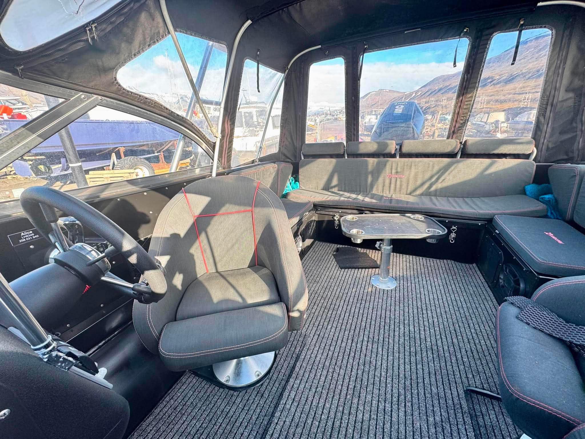 The comfy inside on the polarcircle boat Alice sailing on Svalbard with Backyard Svalbard