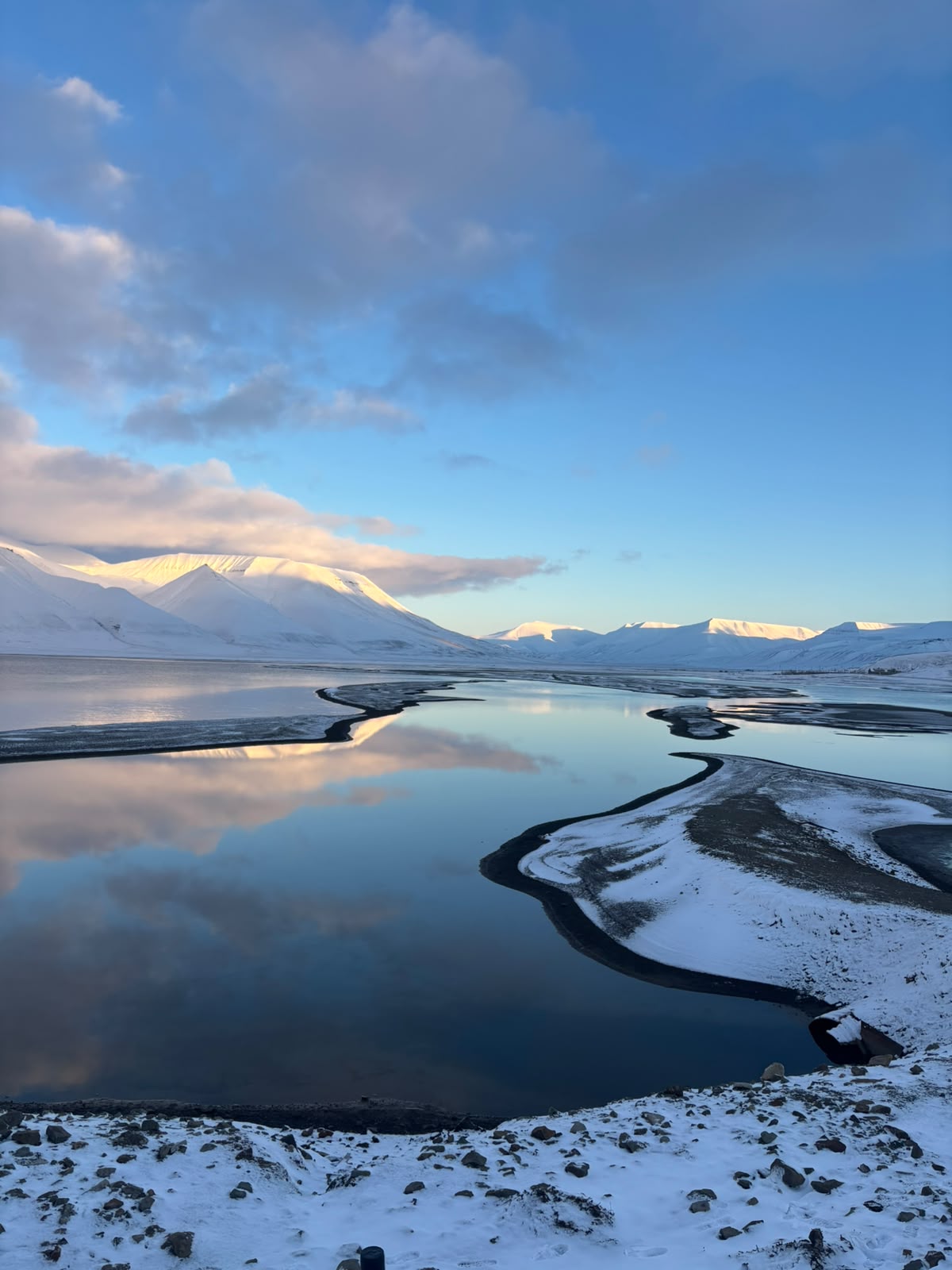 Hiking along the fjords on Svalbard led by a professional guide