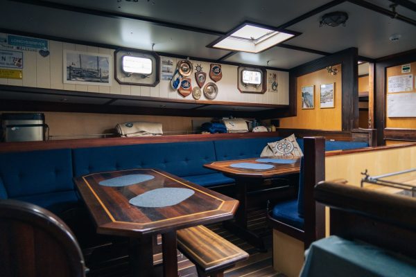 Interior lounge on Saeftinghe ski expedition ship with Backyard Svalbard