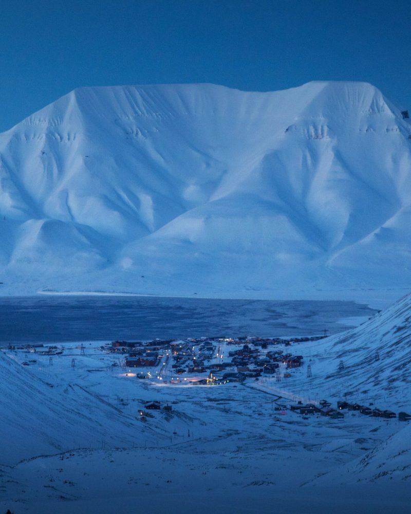 Enjoying the stunning view of Longyearbyen from the mountain returning from our ice cave hike